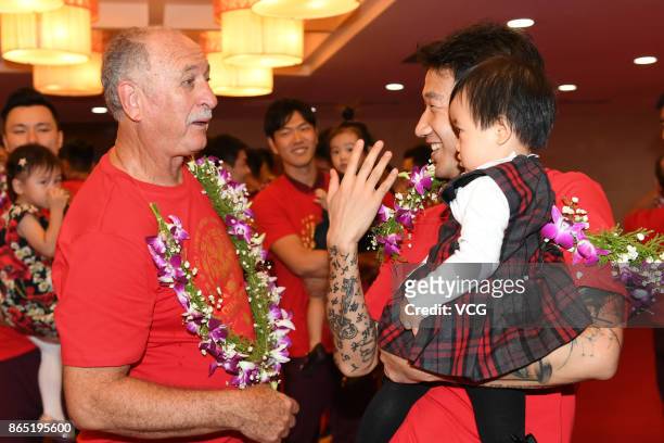 Rong Hao and manager Luiz Felipe Scolari of Guangzhou Evergrande Taobao F.C. Attend a celebration as the club wins the 2017 Chinese Super League...
