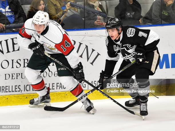 Jared McIsaac of the Halifax Mooseheads and Alexandre Alain of the Blainville-Boisbriand Armada skate against each other during the QMJHL game at...