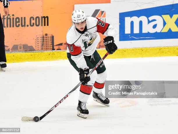 Justin Barron of the Halifax Mooseheads looks to play the puck against the Blainville-Boisbriand Armada during the QMJHL game at Centre d'Excellence...