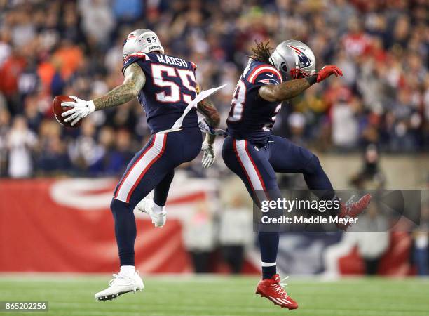 Cassius Marsh reacts with Brandon Bolden of the New England Patriots during the second quarter of a game against the Atlanta Falcons at Gillette...