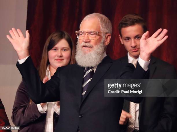Honoree David Letterman waves from the balcony during the 2017 Mark Twain Prize for American Humor at The Kennedy Center on October 22, 2017 in...