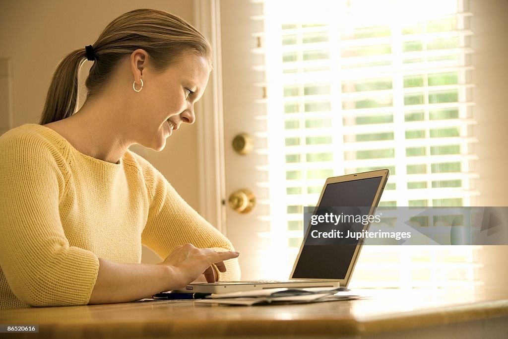 Woman working on laptop