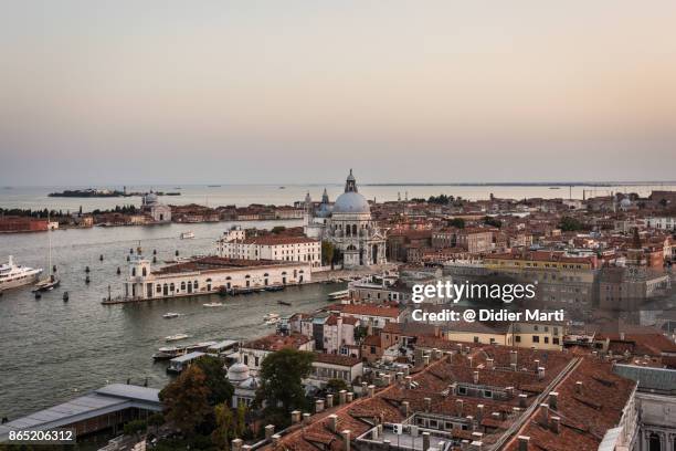 sunset over venice grand canal in italy - torcello fotografías e imágenes de stock