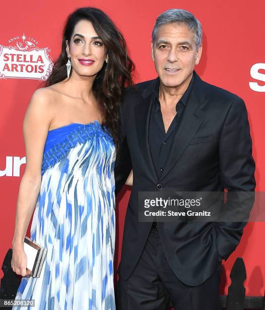 George Clooney, Amal Clooney arrives at the Premiere Of Paramount Pictures' "Suburbicon" at Regency Village Theatre on October 22, 2017 in Westwood,...