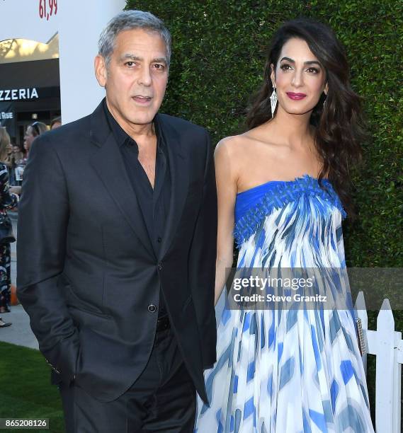 George Clooney, Amal Clooney arrives at the Premiere Of Paramount Pictures' "Suburbicon" at Regency Village Theatre on October 22, 2017 in Westwood,...