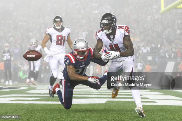 Malcolm Butler of the New England Patriots breaks up a pass inteded for Julio Jones of the Atlanta Falcons during the fourth quarter of a game at...