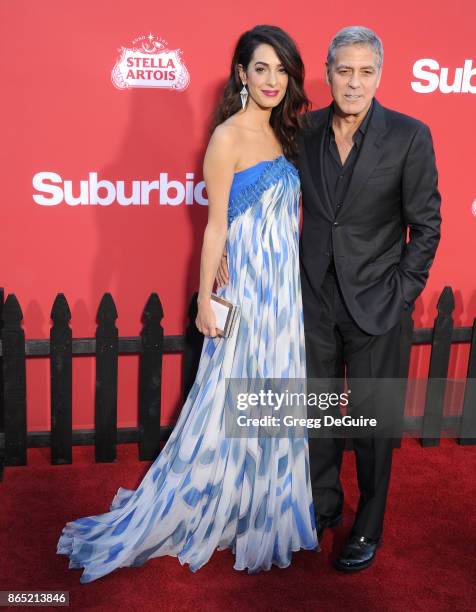 Amal Clooney and George Clooney arrive at the premiere of Paramount Pictures' "Suburbicon" at Regency Village Theatre on October 22, 2017 in...