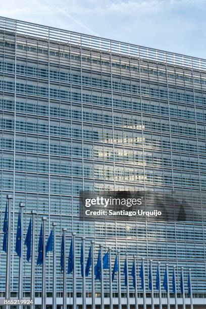 european union flags at berlaymont building of the european commission - european union symbol stock pictures, royalty-free photos & images