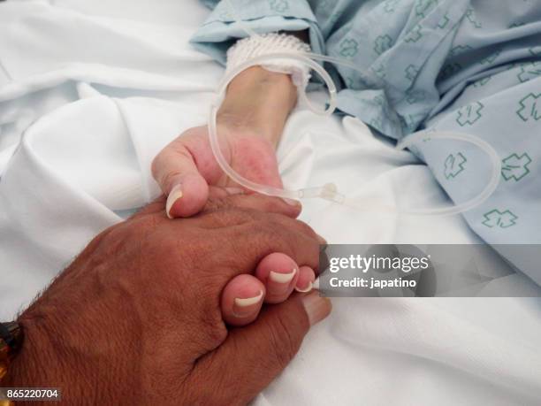 hand of consolation and love of the sick - streptomyces stock pictures, royalty-free photos & images