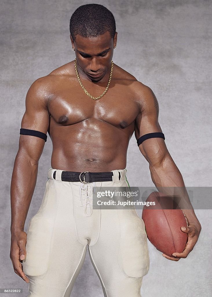 Bodybuilder Defeatec Defeated Muscular Football Player High-Res Stock Photo - Getty Images