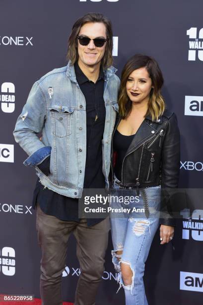 Christopher French and Ashley Tisdale attend AMC Celebrates The 100th Episode Of "The Walking Dead" - Arrivals at The Greek Theatre on October 22,...
