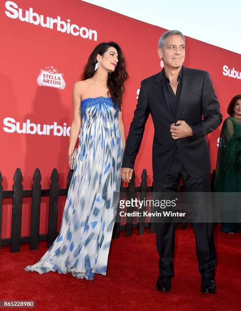 Executive producer George Clooney and his wife Amal Clooney arrive at the premiere of Paramount Pictures' "Suburbicon" at the Village Theatre on...