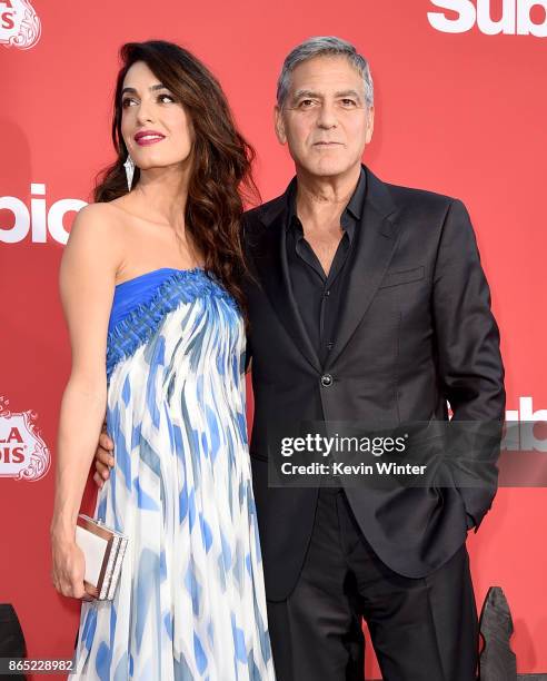 Executive producer George Clooney and his wife Amal Clooney arrive at the premiere of Paramount Pictures' "Suburbicon" at the Village Theatre on...