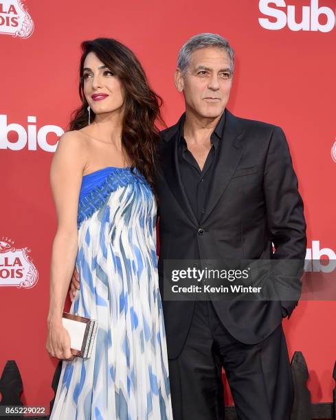 Executive producer George Clooney and his wife Amal Clooney arrive at the premiere of Paramount Pictures' "Suburbicon" at the Village Theatre on...