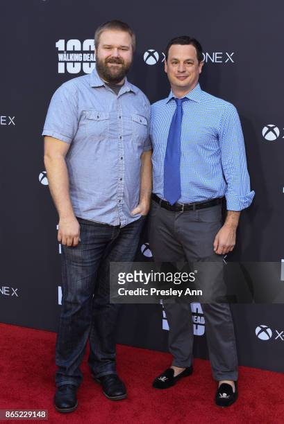 Scott M. Gimple and Robert Kirkman attend AMC Celebrates The 100th Episode Of "The Walking Dead" - Arrivals at The Greek Theatre on October 22, 2017...
