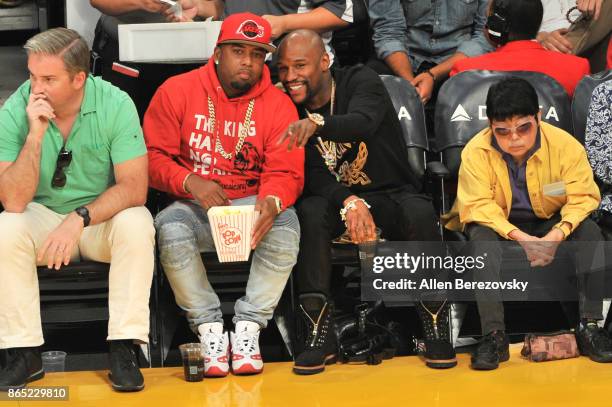Boxer Floyd Mayweather, Jr. And James McNair , CEO TMT Music Group, attend a basketball game between the Los Angeles Lakers and the New Orleans...