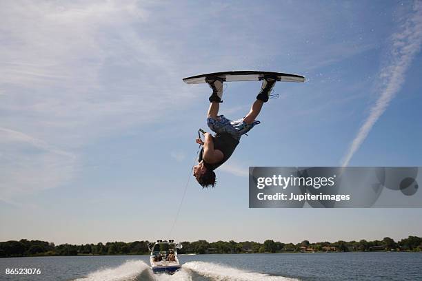 upside-down wakeboarder - water ski stock pictures, royalty-free photos & images