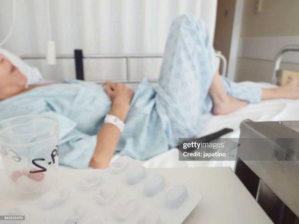Sick woman receiving medication