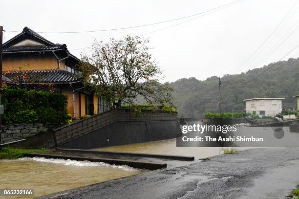 The area is flooded after the bank of Hoshigawauchidanikawa River collapsed due to powerful Typhoon Lan approaches on October 22, 2017 in Tokushima,...