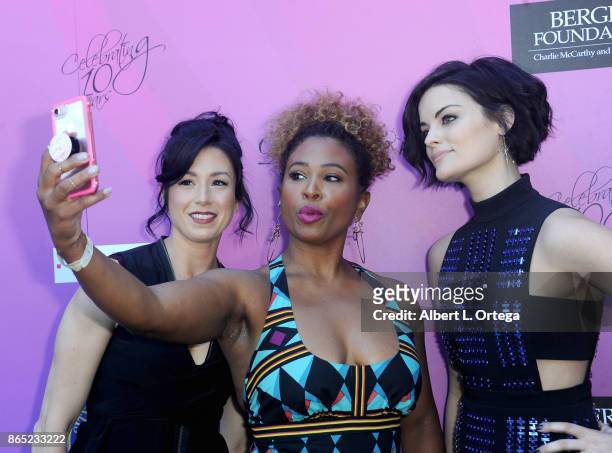 Actress Jaimie Alexander poses with her stunt double Heidi Schnappauf and host Tanika Ray at the 10th Annual Action Icon Awards held at Sheraton...