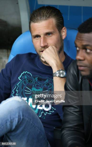 Gregory Sertic of OM sits on the bench during the French Ligue 1 match between Olympique de Marseille and Paris Saint Germain at Stade Velodrome on...