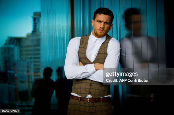 World Boxing Organization contender Gary Corcoran of Britain strikes a pose following a press conference with title holder Jeff Horn of Australia at...