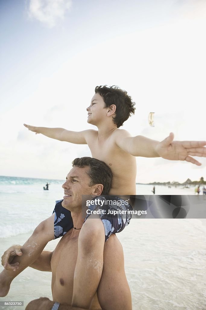 Father and son at beach