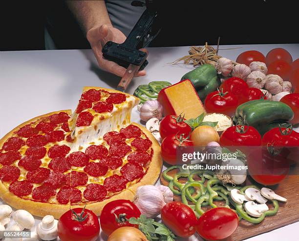pepperoni pizza with ingredients - plum tomatoes stock pictures, royalty-free photos & images