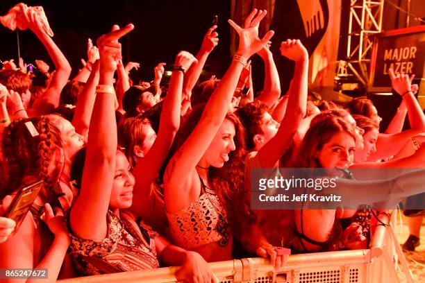 Festivalgoers watch Major Lazer perform at Piestewa Stage during day 3 of the 2017 Lost Lake Festival on October 22, 2017 in Phoenix, Arizona.