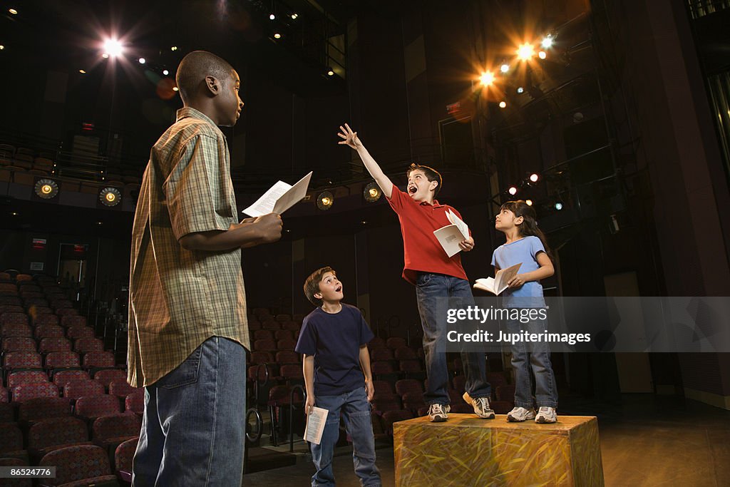 Students practicing a play