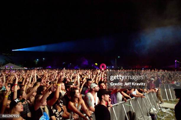 Festivalgoers watch Major Lazer perform at Piestewa Stage during day 3 of the 2017 Lost Lake Festival on October 22, 2017 in Phoenix, Arizona.