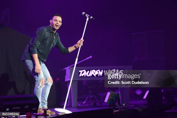 Singer Tauren Wells of the band Royal Tailor performs onstage during the Air 1 Positive Hits tour at Citizens Business Bank Arena on October 22, 2017...