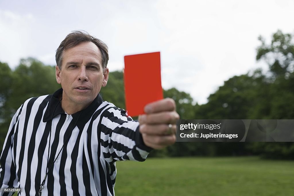 Referee with red card