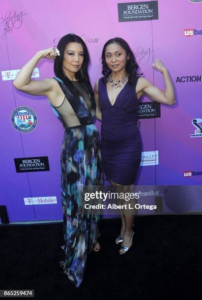 Actress Ming-Na Wen poses with her stunt double Ming Qiu at the 10th Annual Action Icon Awards held at Sheraton Universal on October 22, 2017 in...