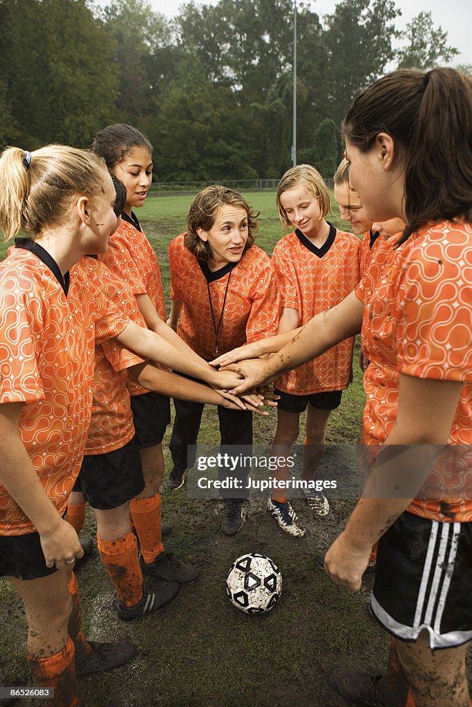 Soccer team huddle