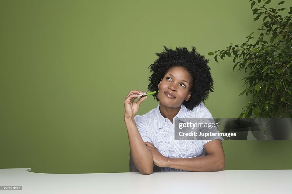 Businesswoman daydreaming