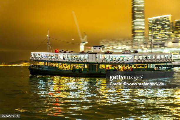 star ferry at night in hong kong - fähre stock pictures, royalty-free photos & images
