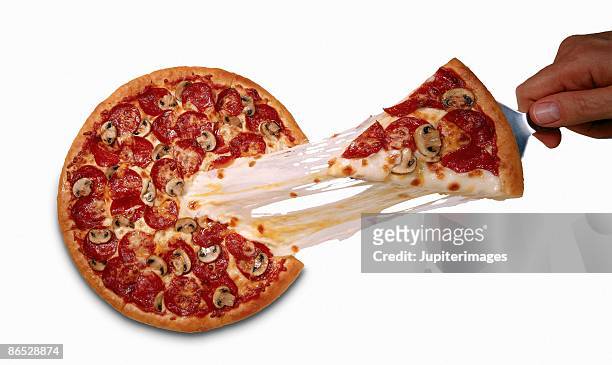 cheesy pizza - cheese pull stockfoto's en -beelden