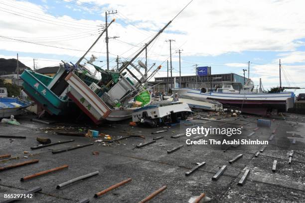 Fish boats are washed ashore after powerful Typhoon Lan hit past on October 23, 2017 in Futtsu, Chiba, Japan. Powerful Typhoon Lan left at least two...