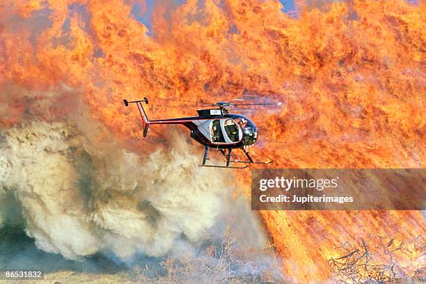 helicopter flying over brush fire - forest fire close up stock pictures, royalty-free photos & images