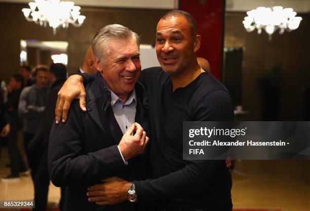 Carlo Ancelotti and Ruud Gullit speak during the 3rd FIFA Legends Think Tank Meeting prior to The Best FIFA Football Awards at The May Fair Hotel on...