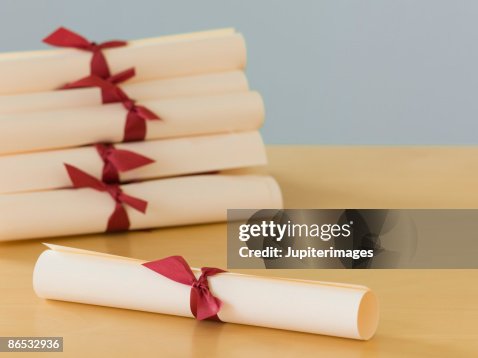 Stack of diplomas Stack of diplomas
