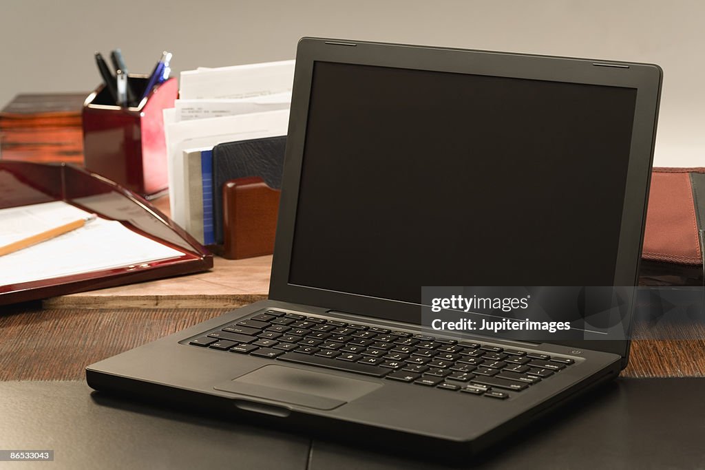 Computer And Open Open Laptop Computer On Desk High-Res Stock Photo - Getty Images