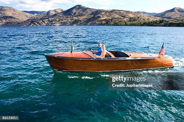 people in boat - lake chelan stock-fotos und bilder