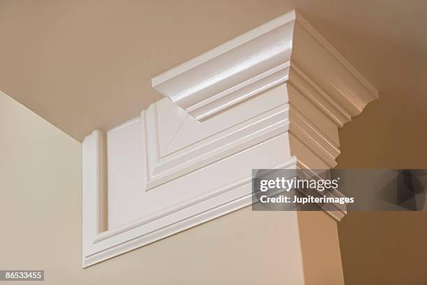 crown molding in home - crown molding stock-fotos und bilder