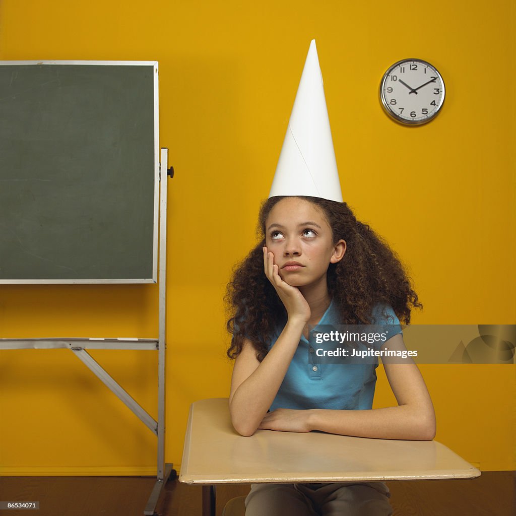 Girl in dunce cap