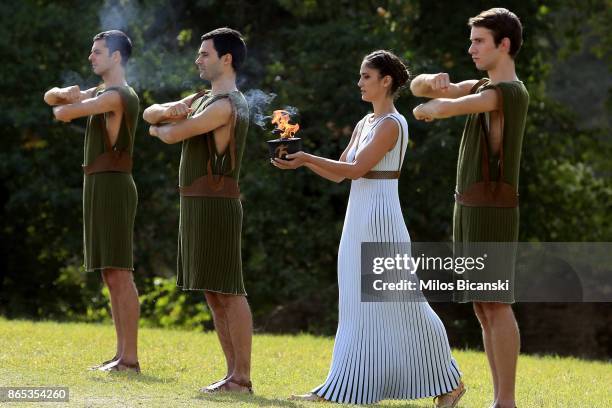 High priestess perform at the Temple of Hera during a dressed rehearsal of the lighting ceremony of the Olympic flame in ancient Olympia on October...