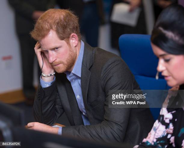 Prince Harry answers calls from veterans in the call centre during his visit to Veterans UK to mark the 25th anniversary of the Veterans UK Helpline...