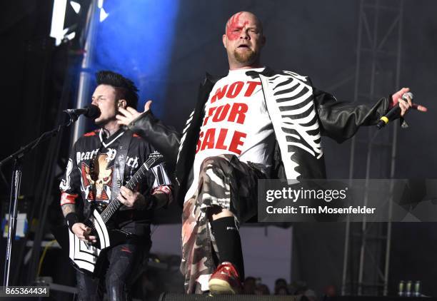 Jason Hook and Ivan L. Moody of Five Finger Death Punch perform during the Monster Energy Aftershock Festival at Discovery Park on October 22, 2017...