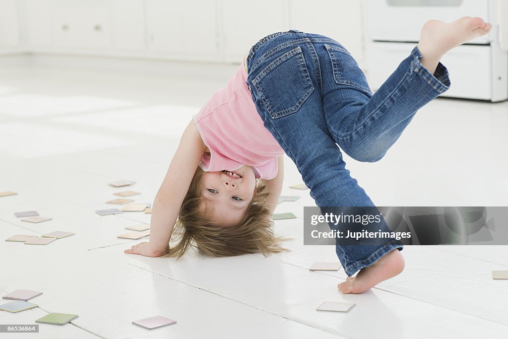 Girl doing headstand